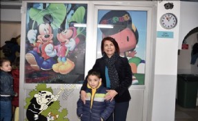 MUCİZE ÇOCUK MURAT İLK KARNESİNİ BAŞKAN TOPRAK´TAN ALDI